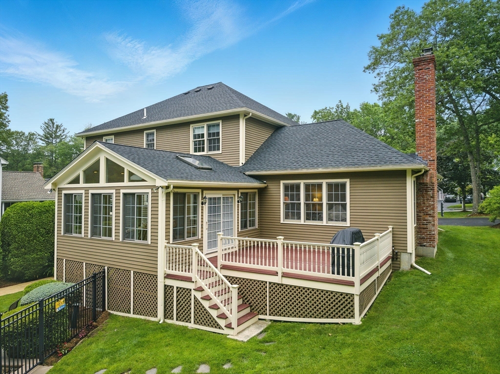 36 Buehler Road Bedford, MA 01730 - Photo 26 of 40 a front view of a house with a yard