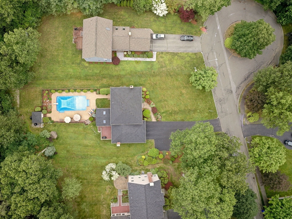 36 Buehler Road Bedford, MA 01730 - Photo 40 of 40 an aerial view of a house with garden space houses and lake view