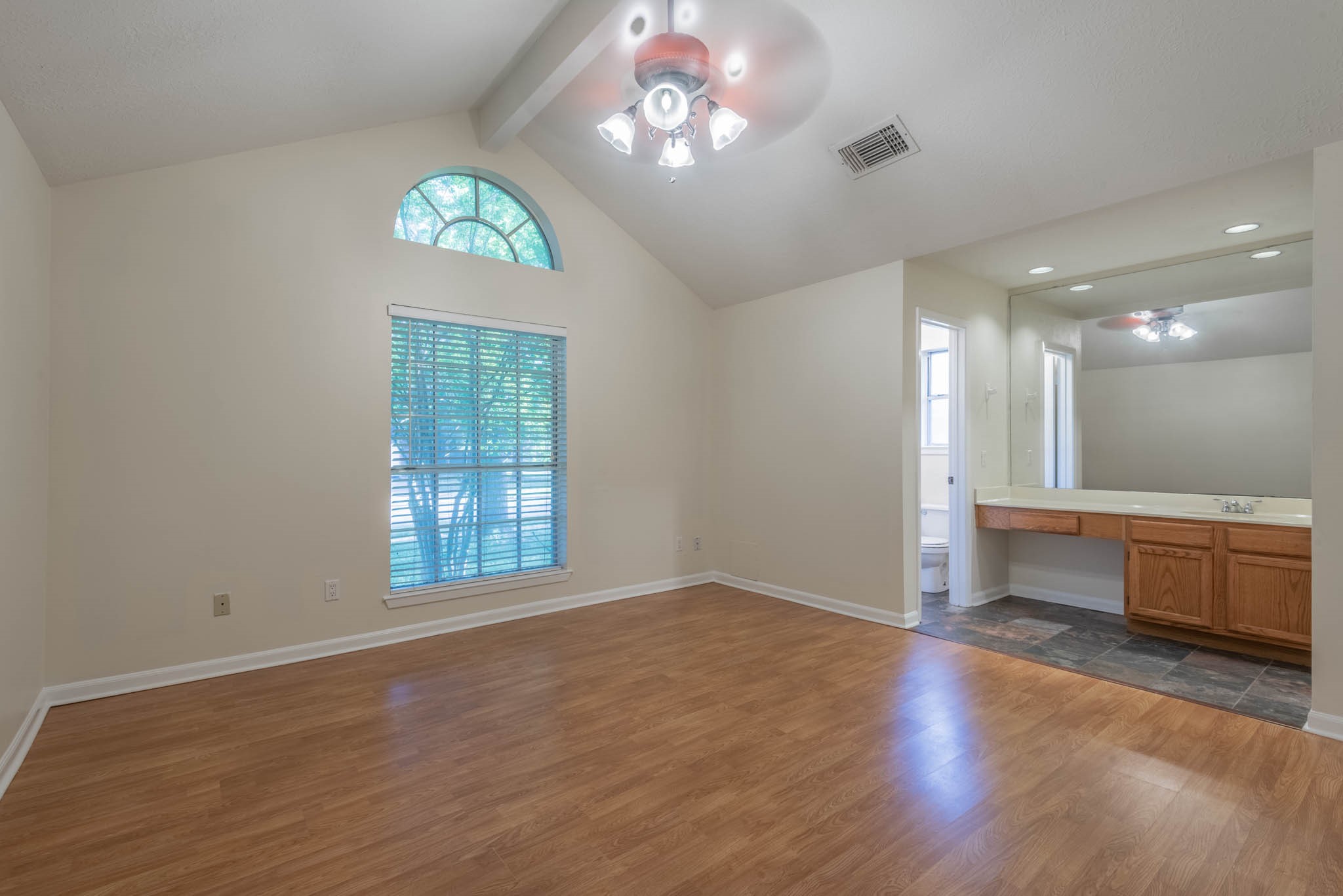 4922 Temple Bell Drive Spring, TX 77388 - Photo 13 of 21 a view of an empty room with a window and wooden floor