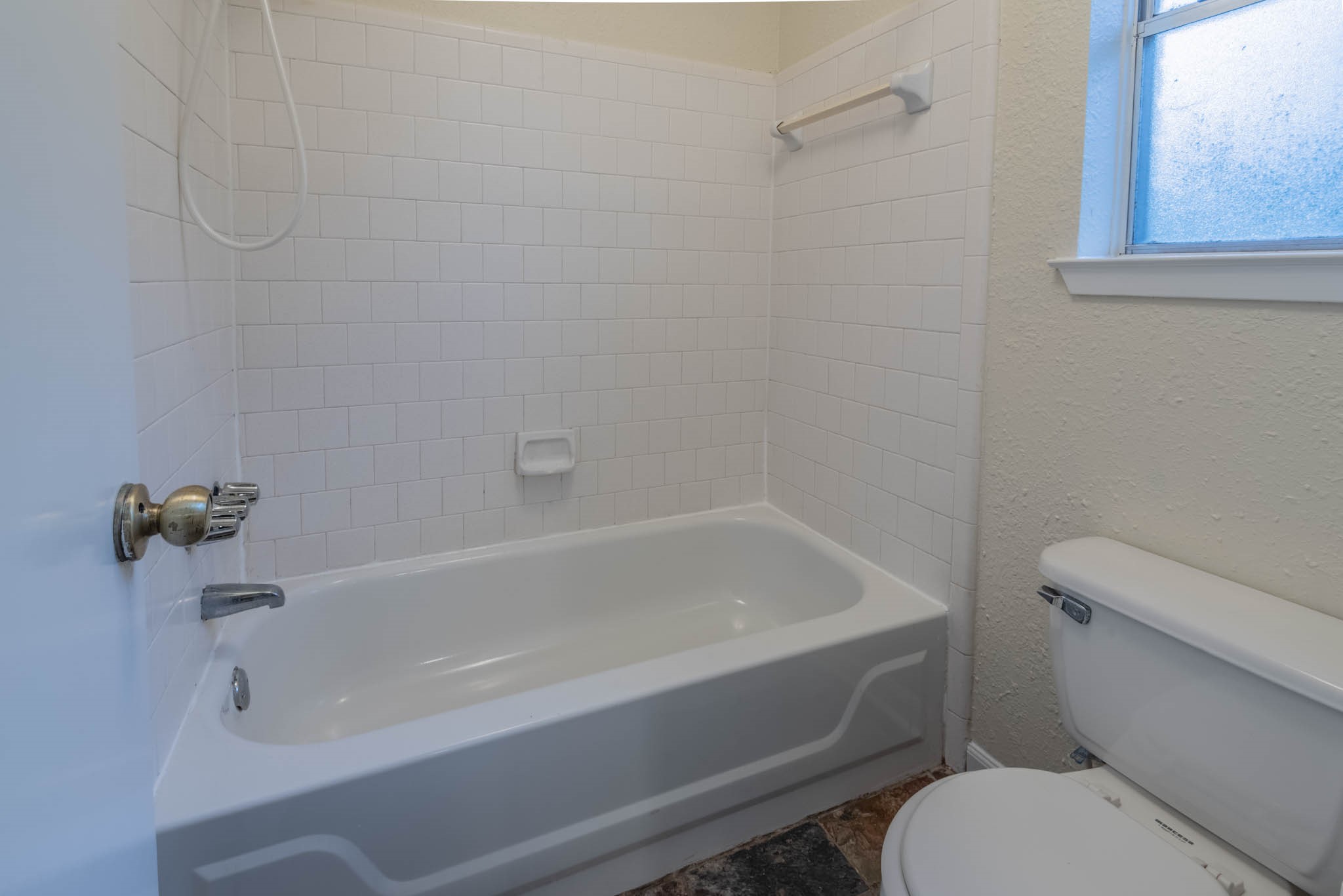 4922 Temple Bell Drive Spring, TX 77388 - Photo 19 of 21 a bathroom with a toilet and a bathtub