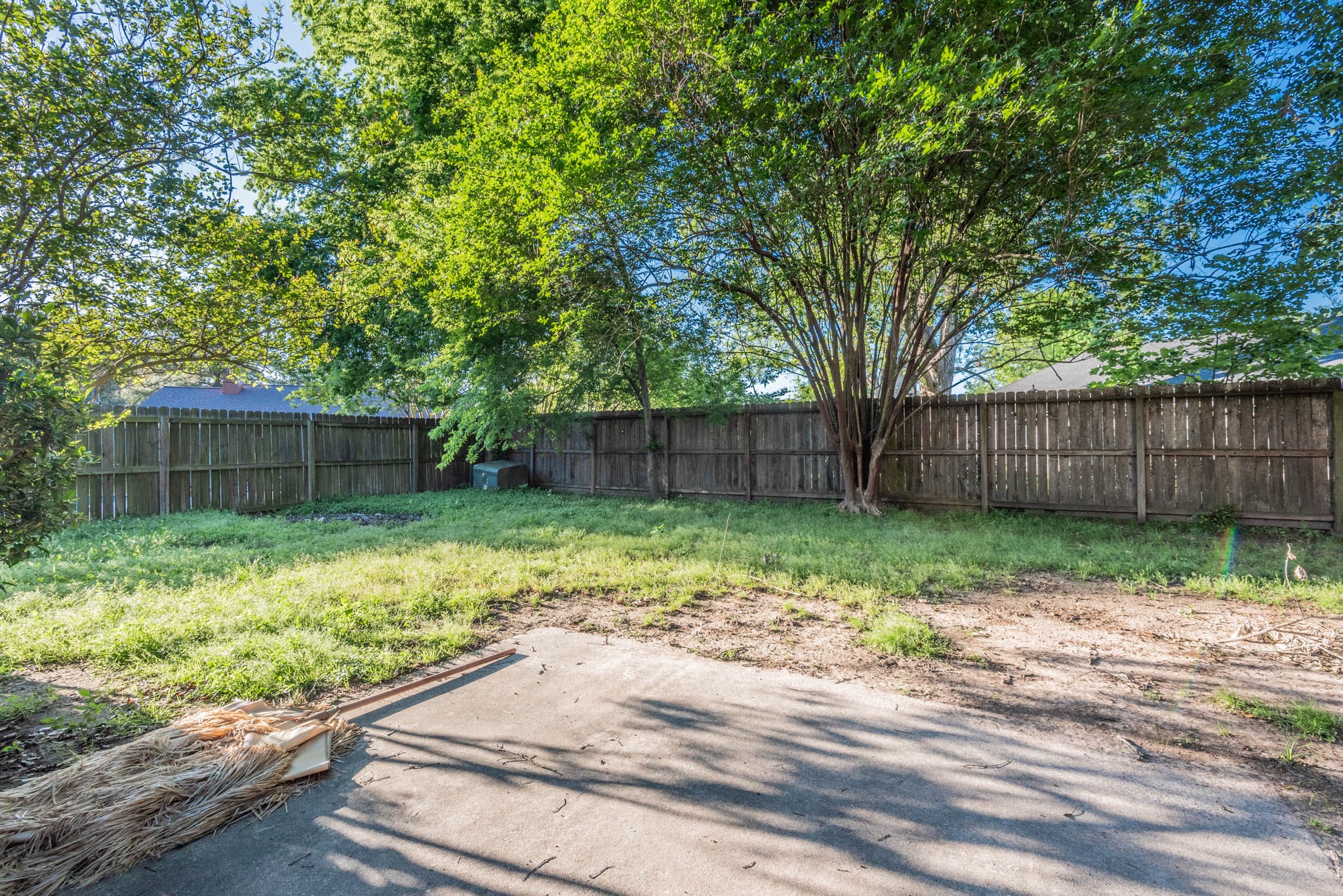 4922 Temple Bell Drive Spring, TX 77388 - Photo 21 of 21 a backyard of a house with green landscape