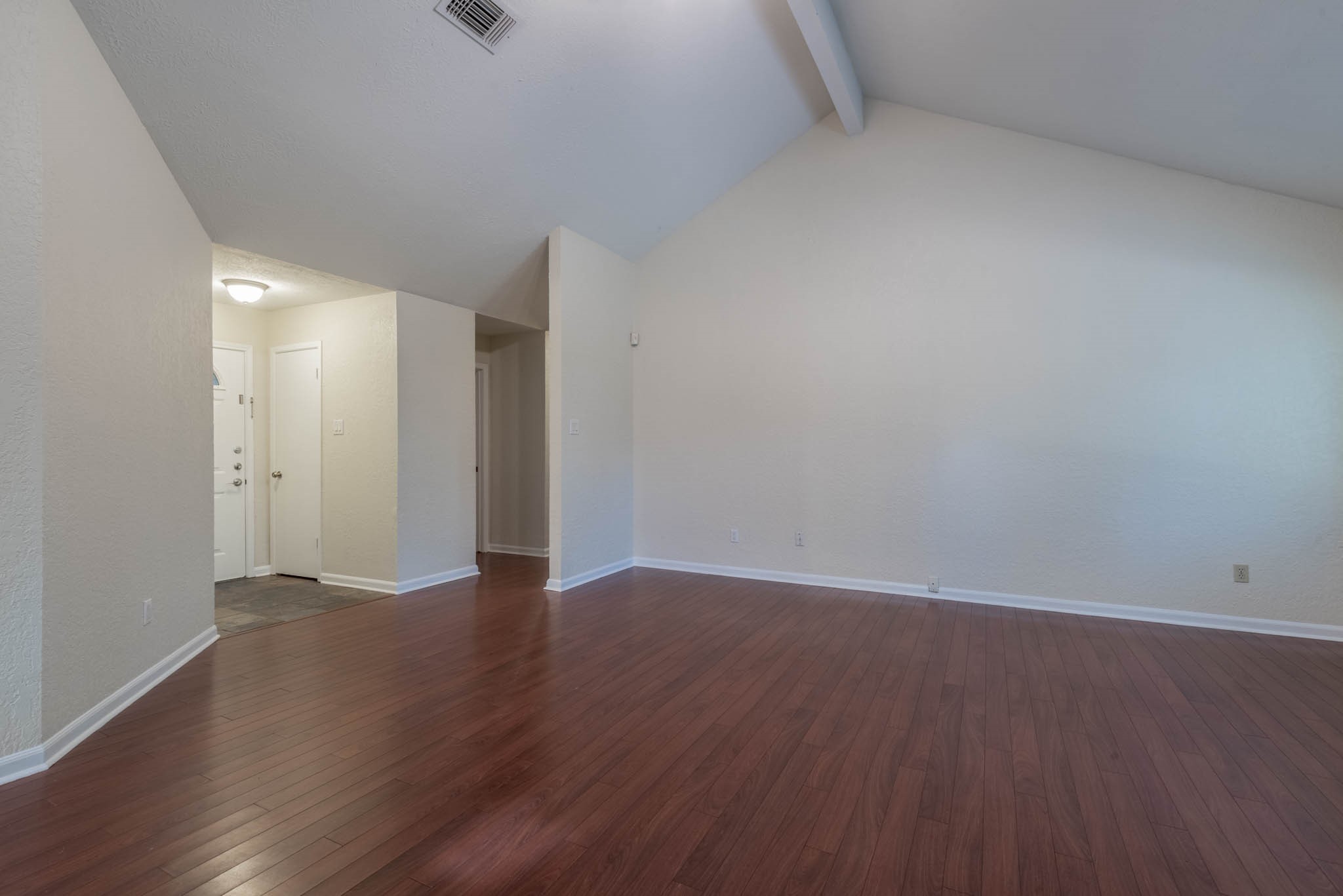 4922 Temple Bell Drive Spring, TX 77388 - Photo 3 of 21 a view of an empty room with wooden floor