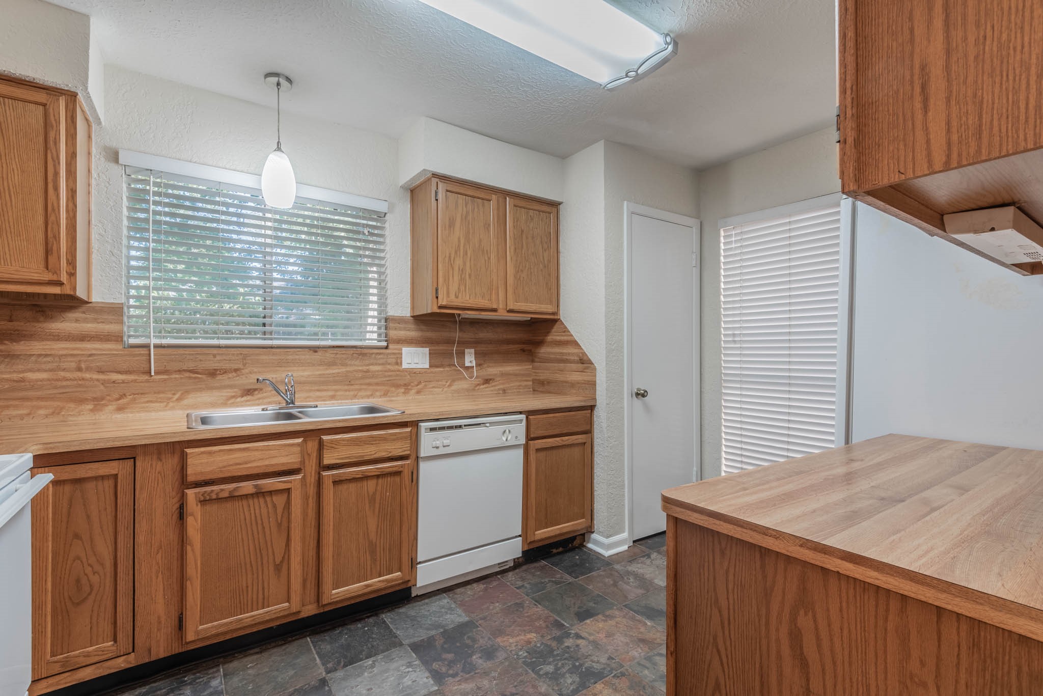 4922 Temple Bell Drive Spring, TX 77388 - Photo 8 of 21 a kitchen that has a sink and a window