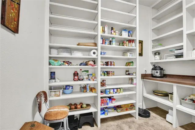 a room with a book shelf