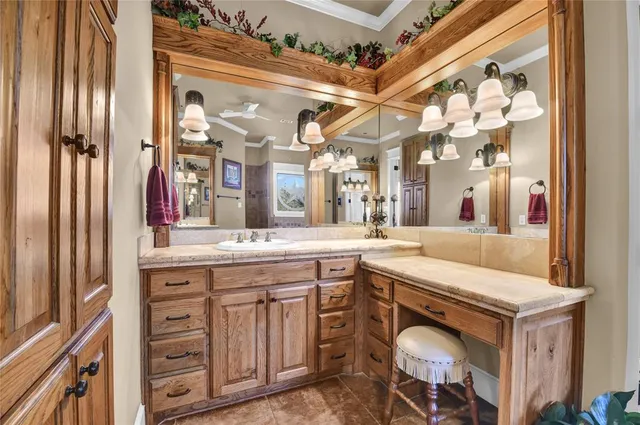 a kitchen with a sink cabinets and appliances