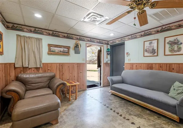 a living room with furniture and couch
