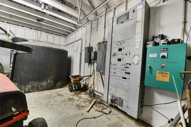 a view of house with backyard and outdoor seating