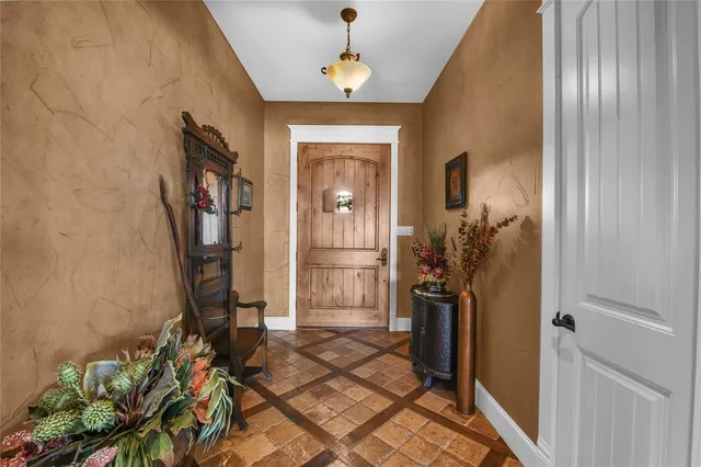 a very nice looking room with a potted plant