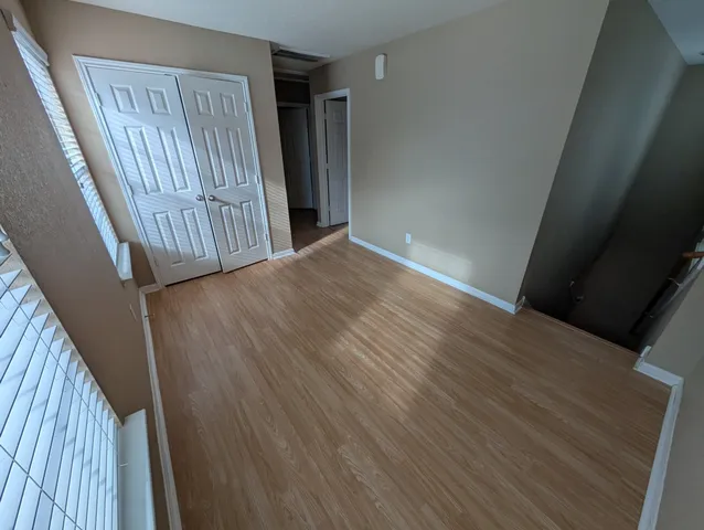 a view of entryway with wooden floor