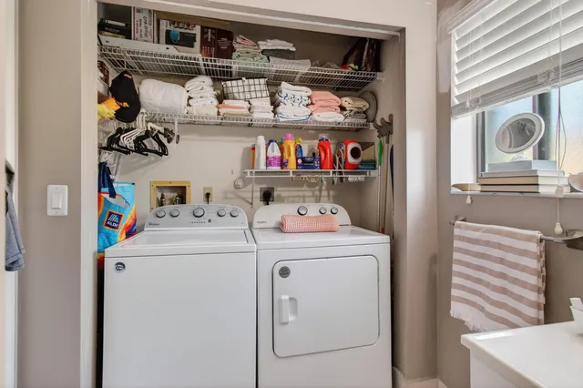 a utility room with dryer and washer