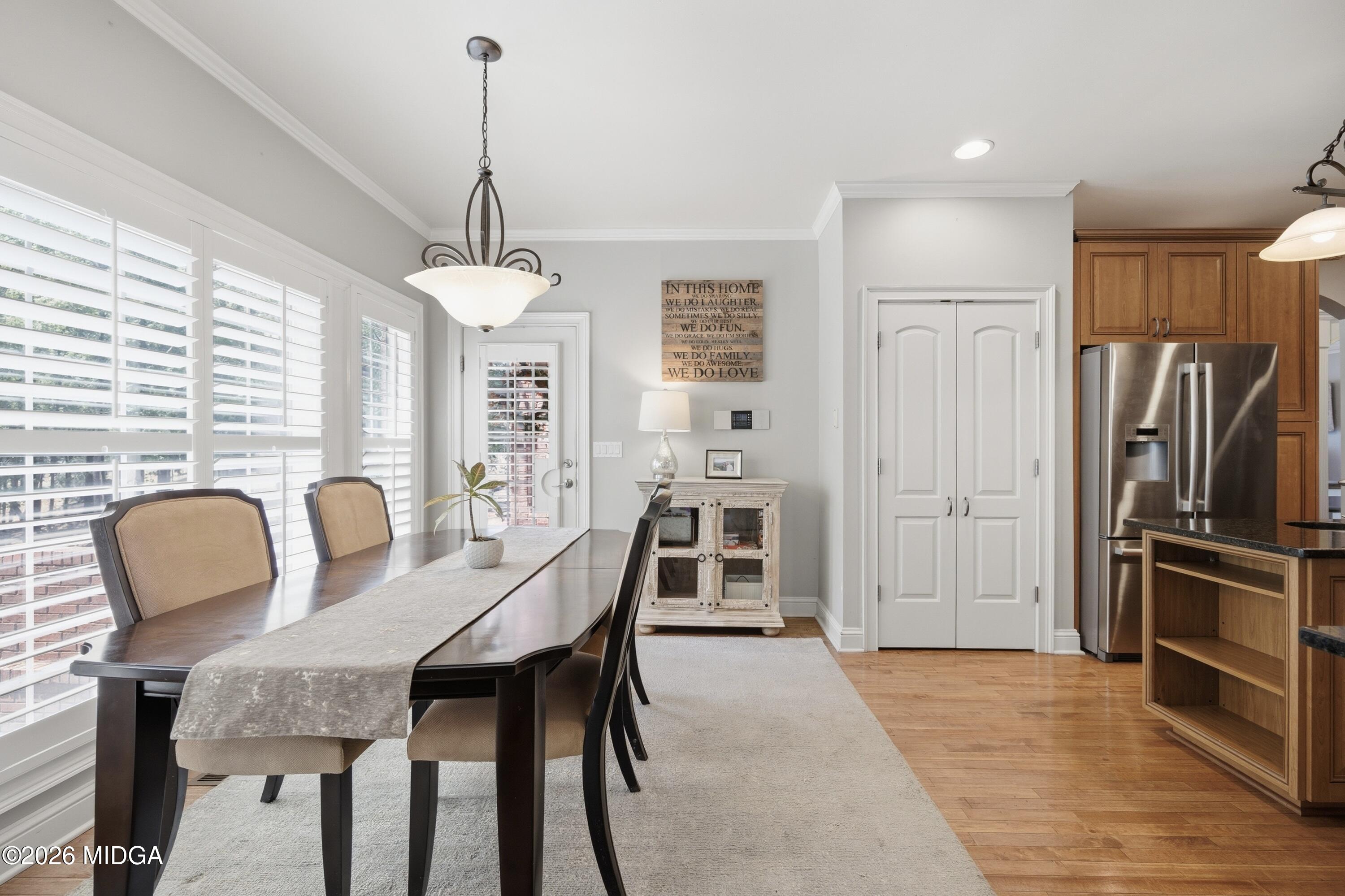 102 Tee Drive Forsyth, GA 31029 - Photo 13 of 53 a dining room with furniture and window