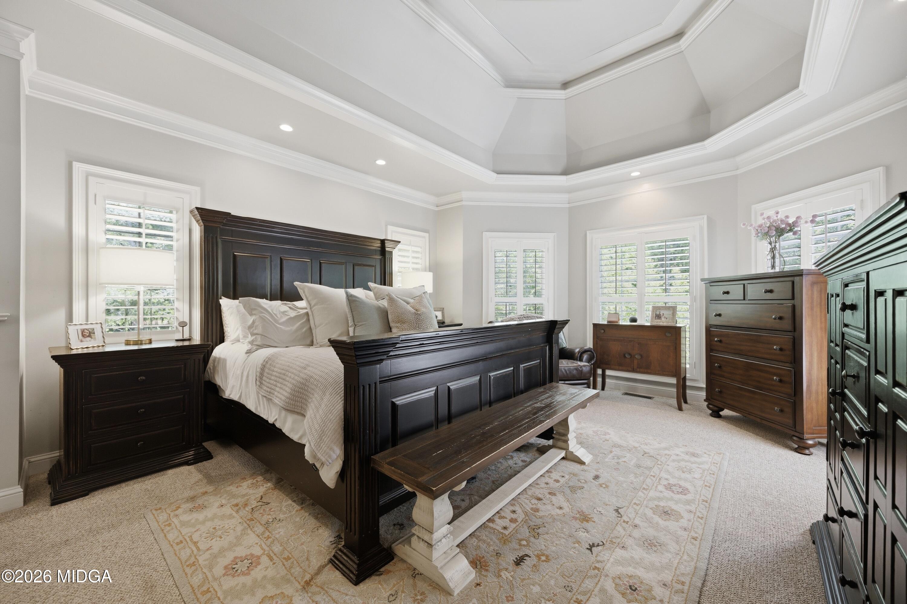 102 Tee Drive Forsyth, GA 31029 - Photo 26 of 53 a bedroom with furniture and a flat screen tv