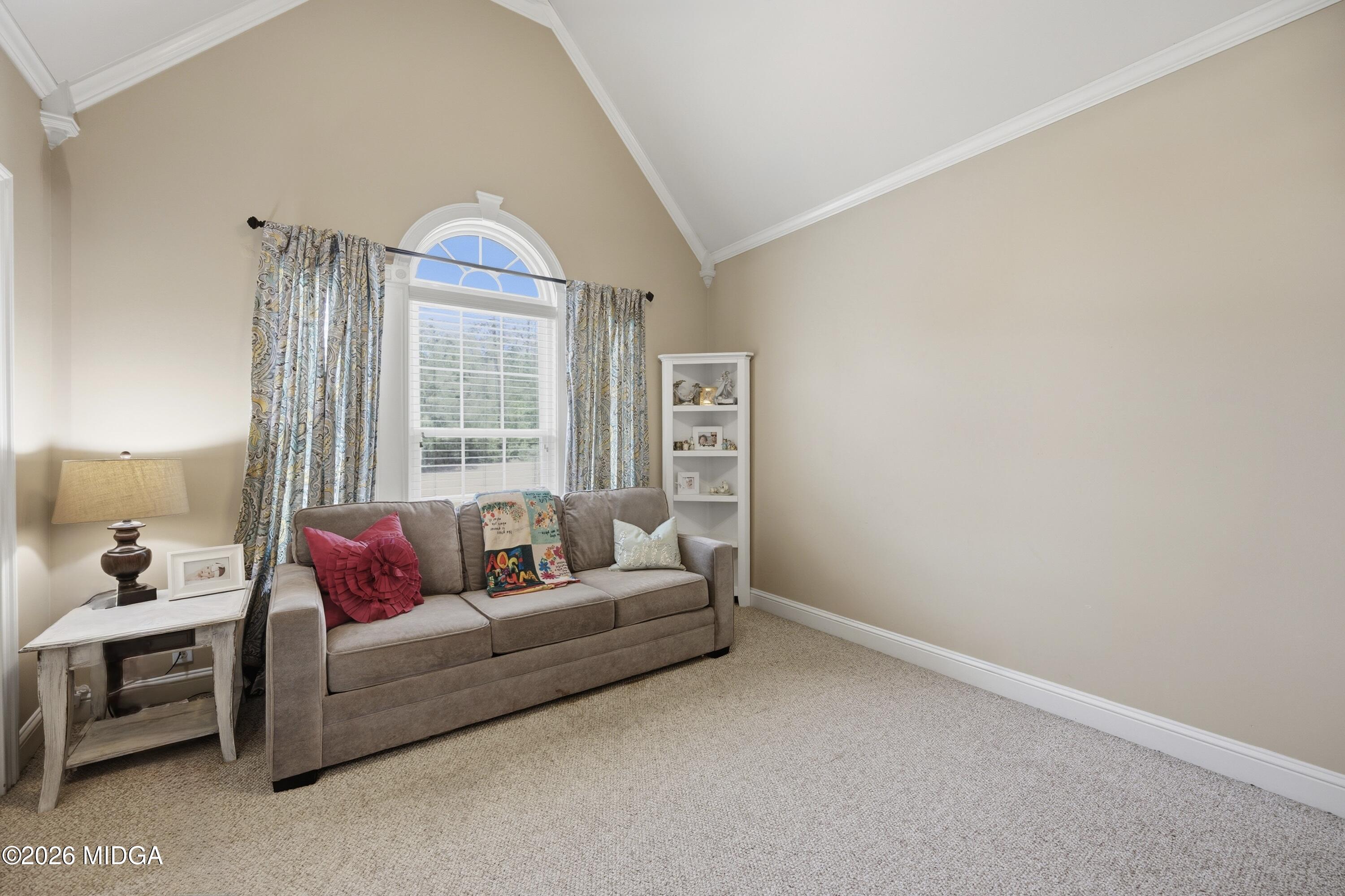 102 Tee Drive Forsyth, GA 31029 - Photo 34 of 53 a living room with furniture and a window