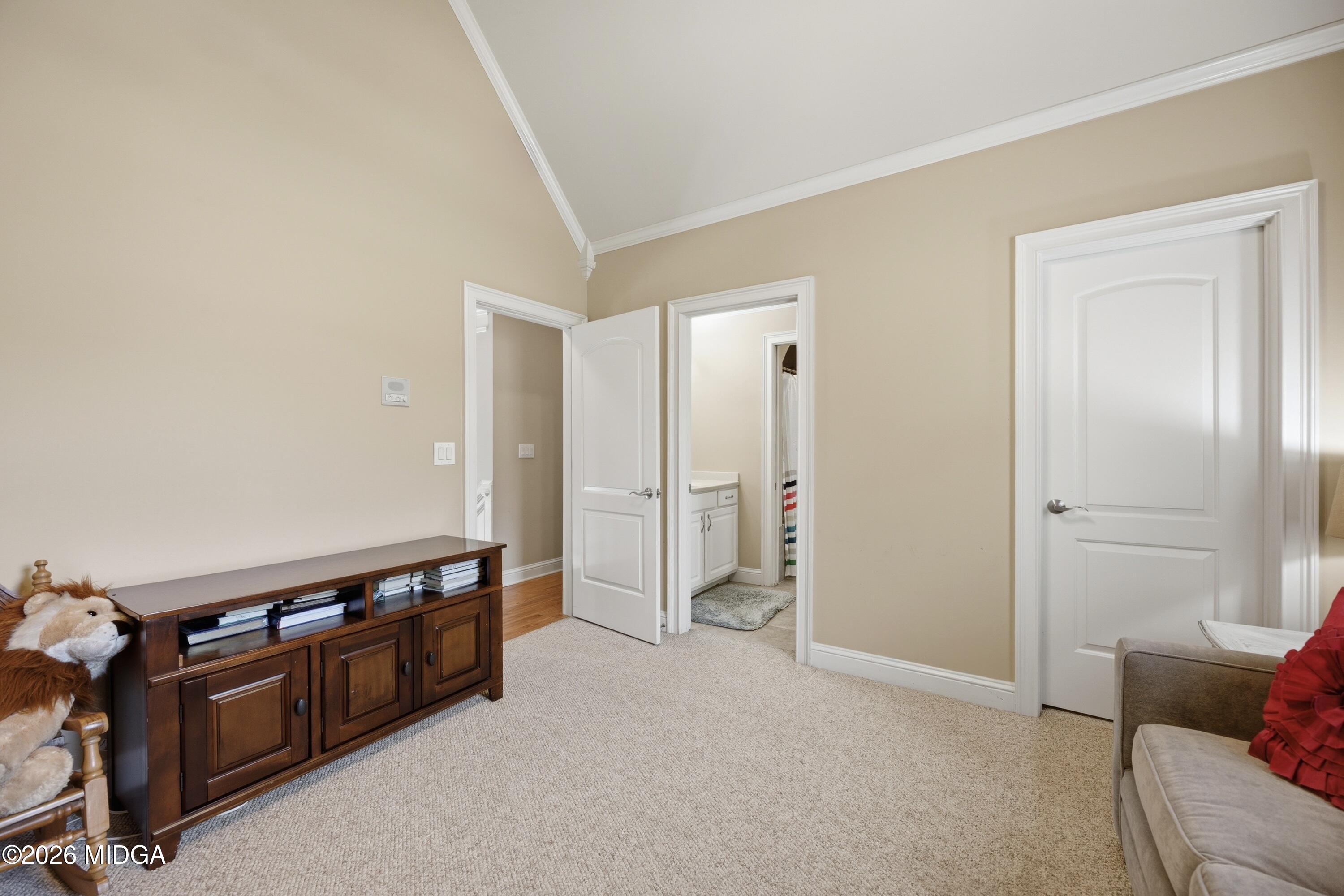 102 Tee Drive Forsyth, GA 31029 - Photo 35 of 53 a view of a livingroom with furniture and an empty room
