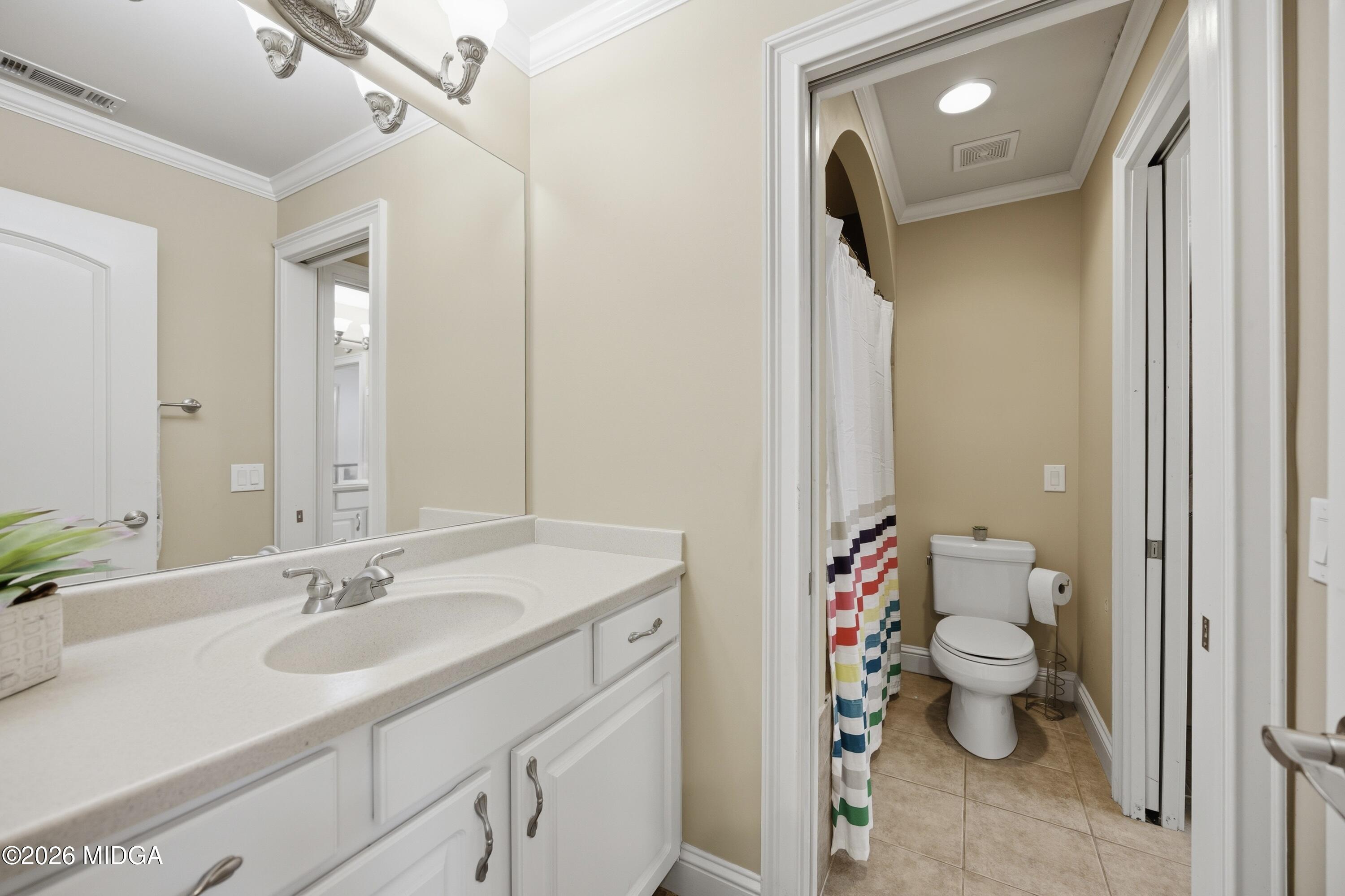 102 Tee Drive Forsyth, GA 31029 - Photo 36 of 53 a bathroom with a sink toilet and a mirror