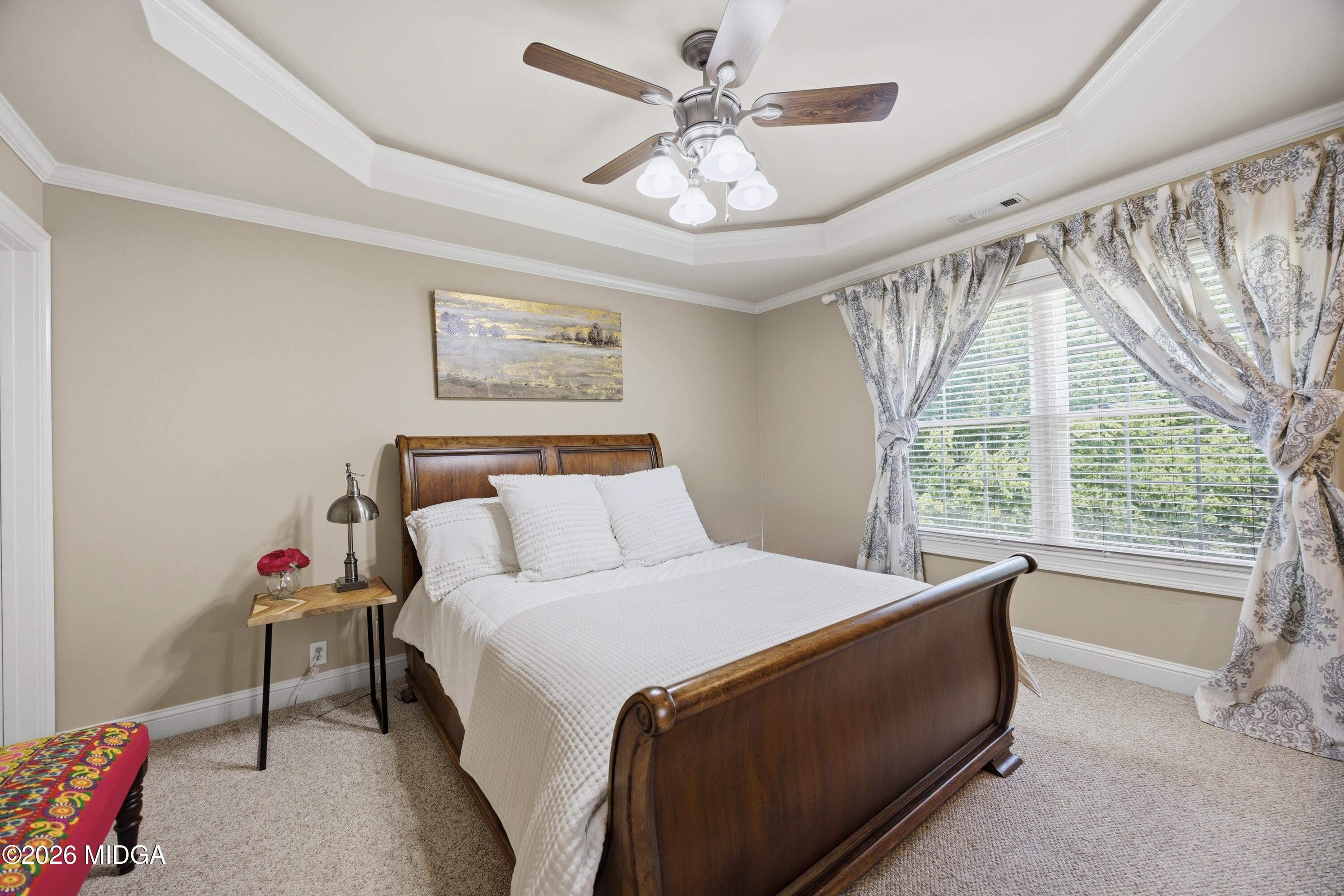 102 Tee Drive Forsyth, GA 31029 - Photo 40 of 53 a bed room with a bed and a window