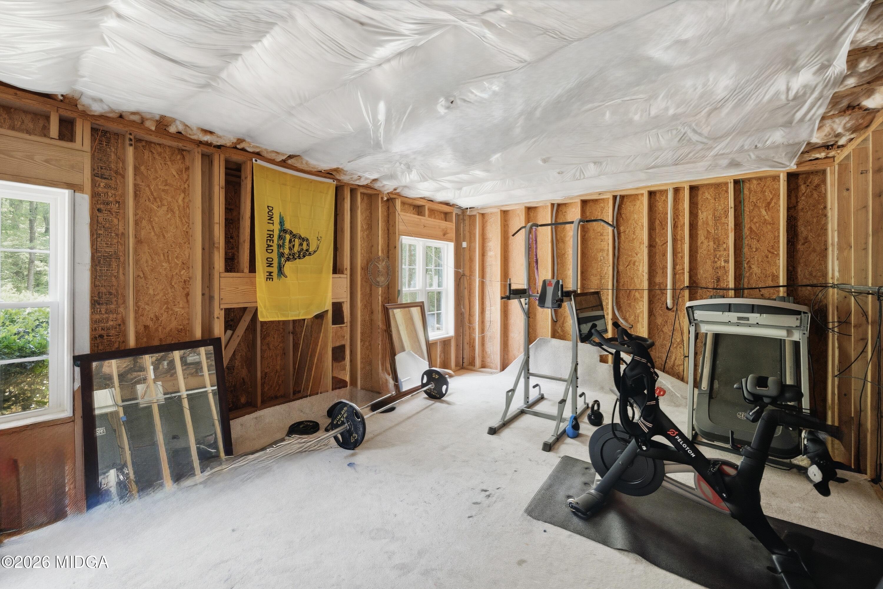 102 Tee Drive Forsyth, GA 31029 - Photo 44 of 53 a view of a room with gym equipment