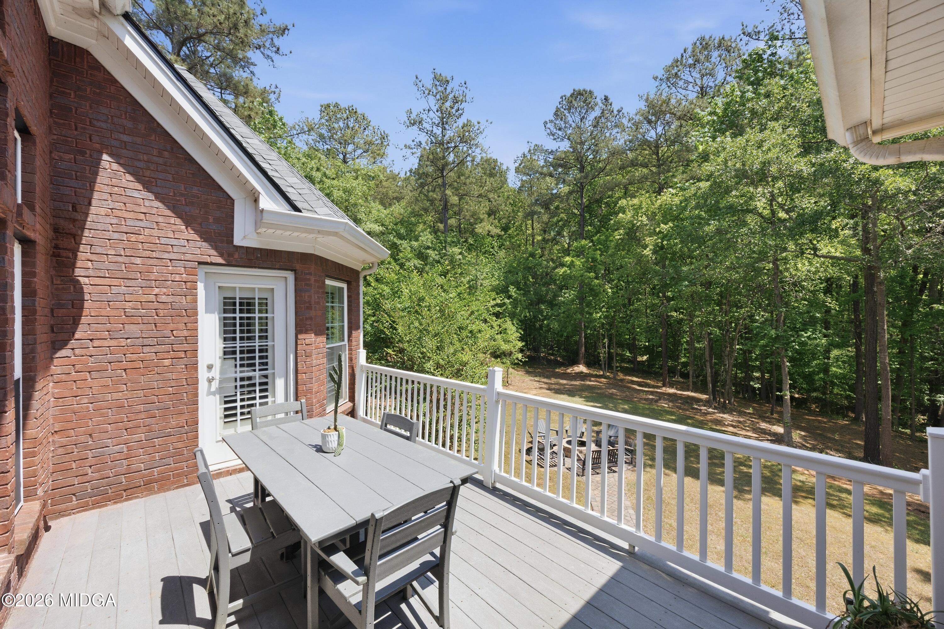 102 Tee Drive Forsyth, GA 31029 - Photo 47 of 53 a view of a balcony with furniture