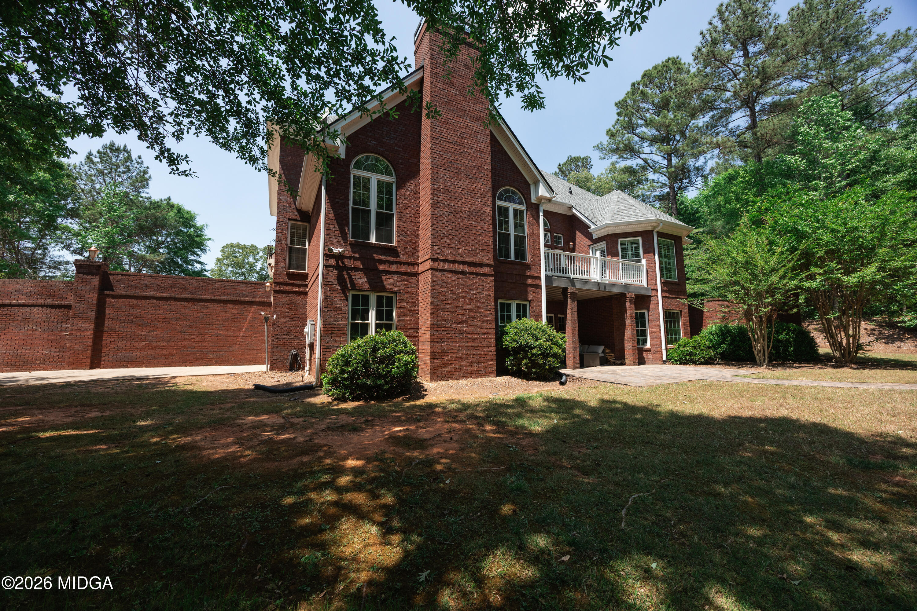 102 Tee Drive Forsyth, GA 31029 - Photo 51 of 53 a front view of a house with a yard