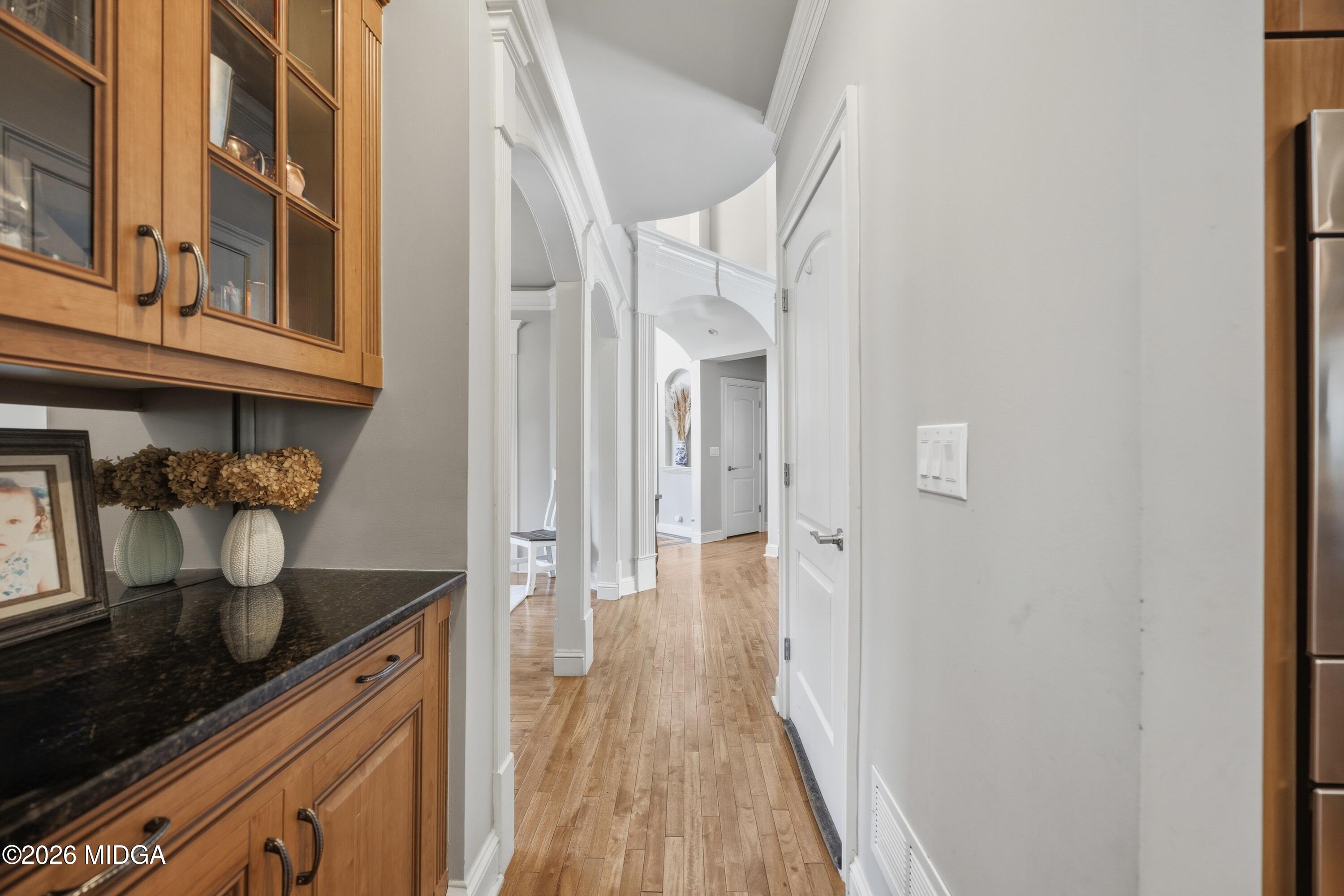 102 Tee Drive Forsyth, GA 31029 - Photo 7 of 53 a view of a kitchen from the hallway