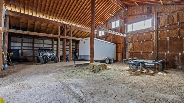 a couple of chairs in front of building