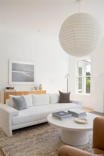 a living room with furniture and window