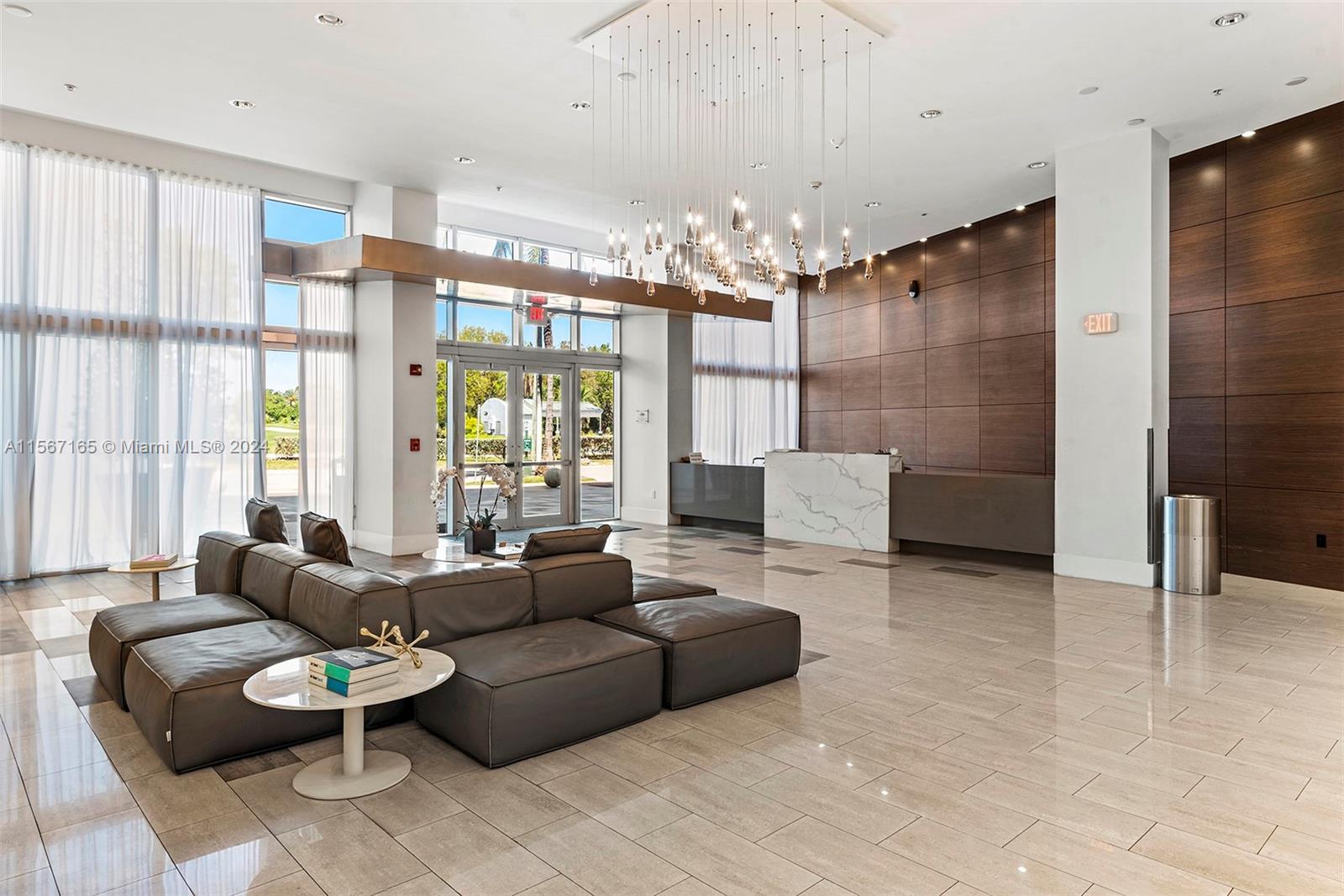 2001 Meridian Avenue, Unit 517 Miami Beach, FL 33139 - Photo 28 of 28 a living room with furniture and a large window