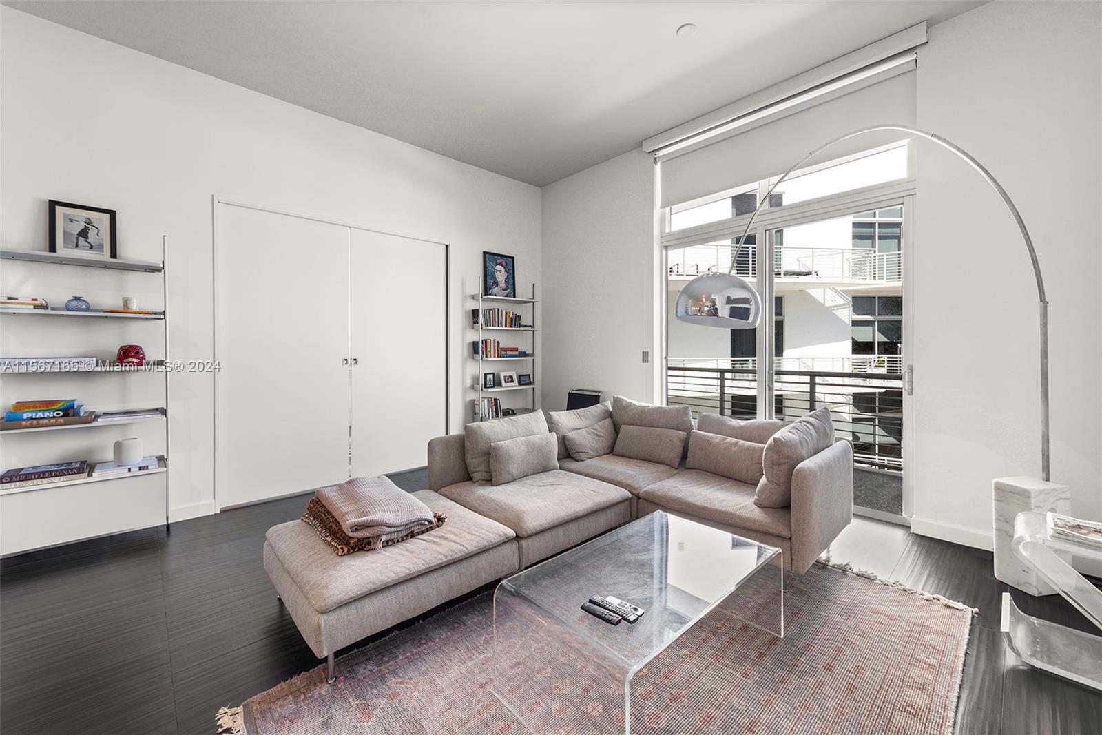 2001 Meridian Avenue, Unit 517 Miami Beach, FL 33139 - Photo 8 of 28 a living room with furniture and a window