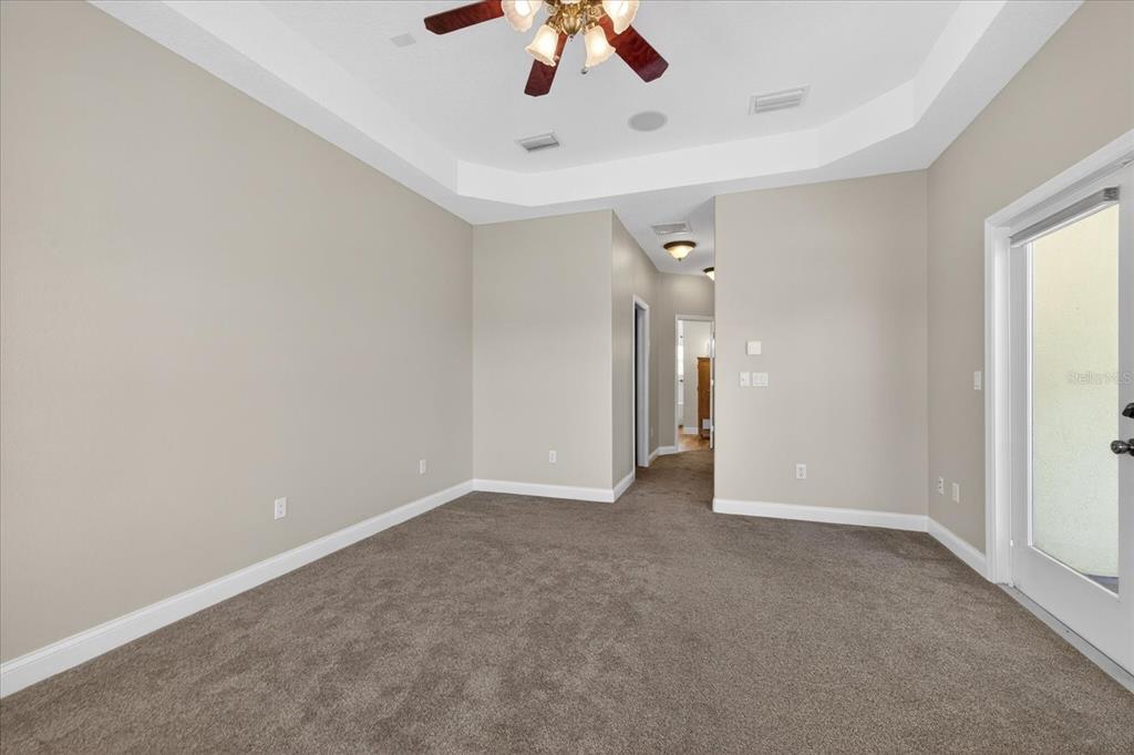 3339 Seaway Drive New Port Richey, FL 34652 - Photo 20 of 74 an empty room with a ceiling fan and window