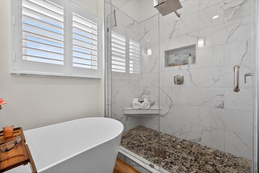 3339 Seaway Drive New Port Richey, FL 34652 - Photo 25 of 74 a bedroom with a bed and a window
