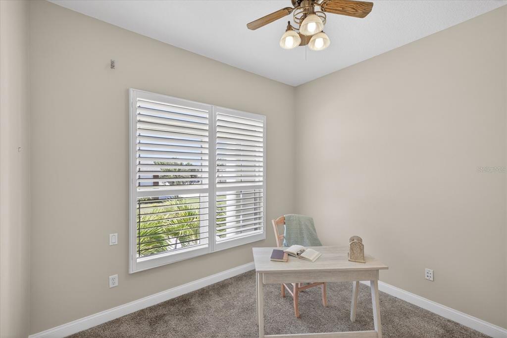 3339 Seaway Drive New Port Richey, FL 34652 - Photo 26 of 74 a view of a workspace with furniture and a window