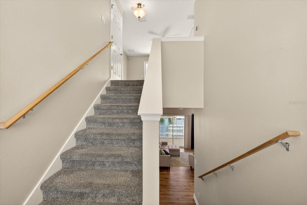 3339 Seaway Drive New Port Richey, FL 34652 - Photo 28 of 74 a view of entryway and hall with wooden floor