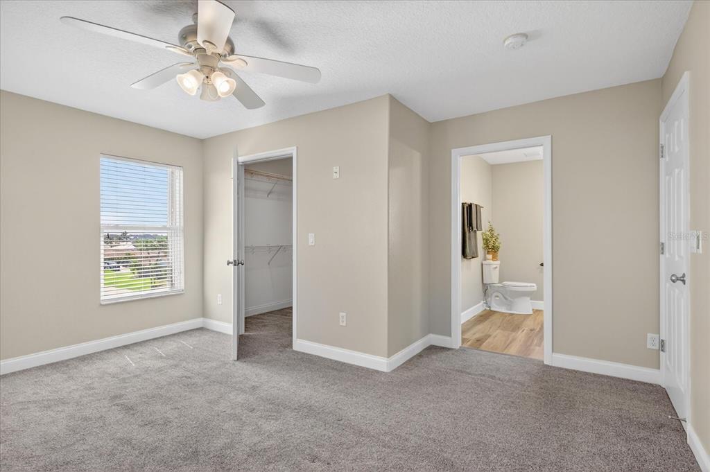 3339 Seaway Drive New Port Richey, FL 34652 - Photo 32 of 74 wooden floor in an empty room and a window
