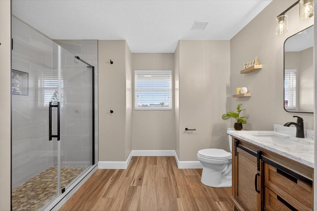 3339 Seaway Drive New Port Richey, FL 34652 - Photo 41 of 74 a bathroom with a sink and a mirror