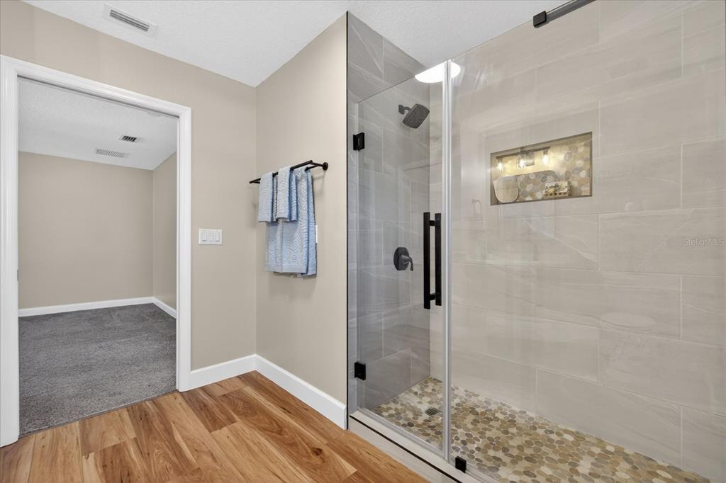 3339 Seaway Drive New Port Richey, FL 34652 - Photo 42 of 74 a view of a bathroom with a shower