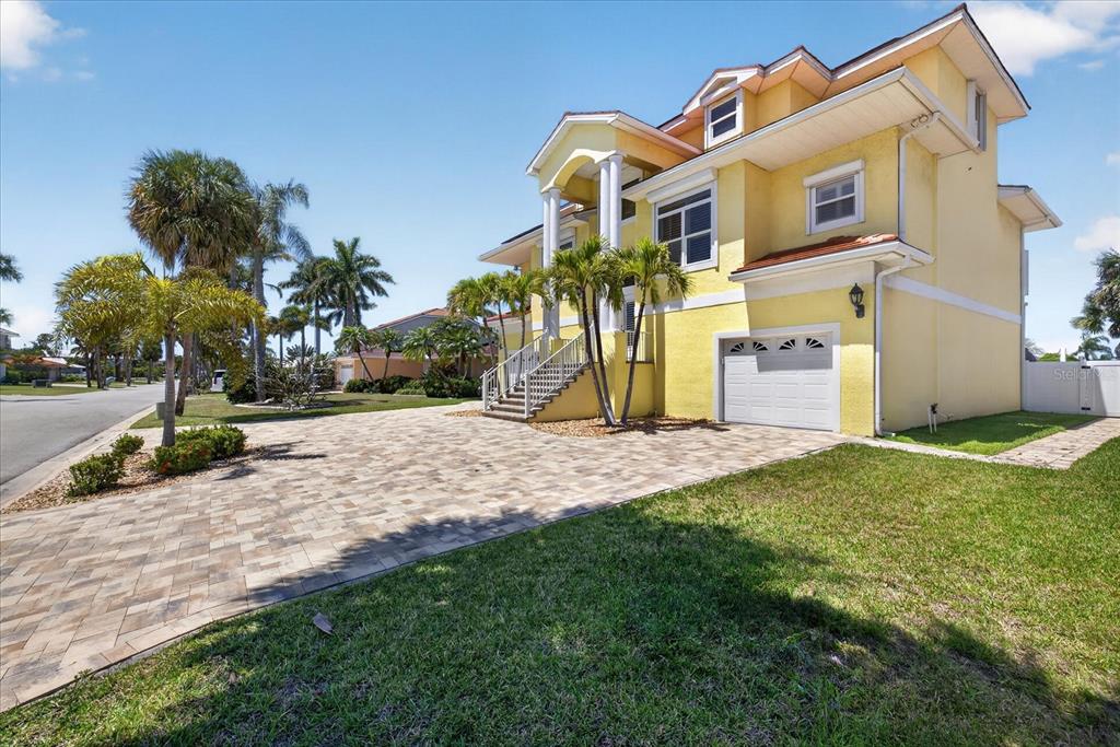 3339 Seaway Drive New Port Richey, FL 34652 - Photo 66 of 74 a view of a yard with a house