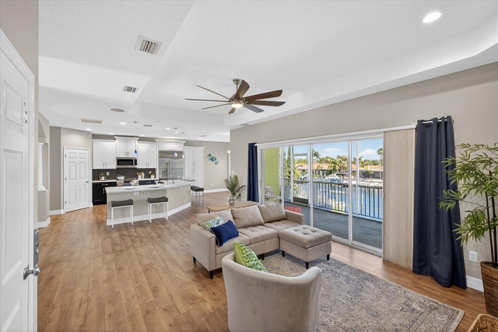 3339 Seaway Drive New Port Richey, FL 34652 - Photo 9 of 74 a living room with furniture and a floor to ceiling window