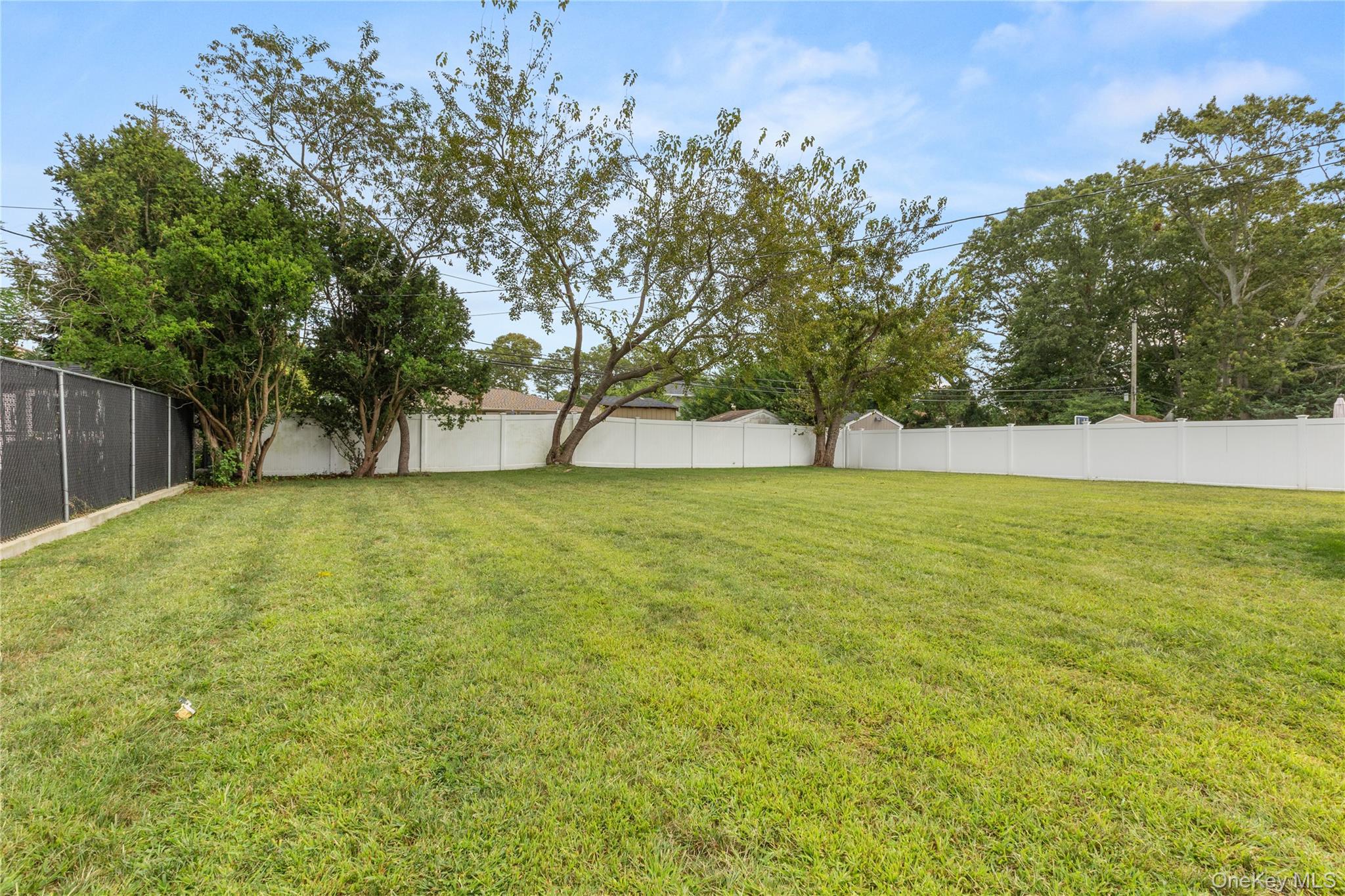 205 Timber Point Road East Islip, NY 11730 - Photo 13 of 16 View of fenced backyard