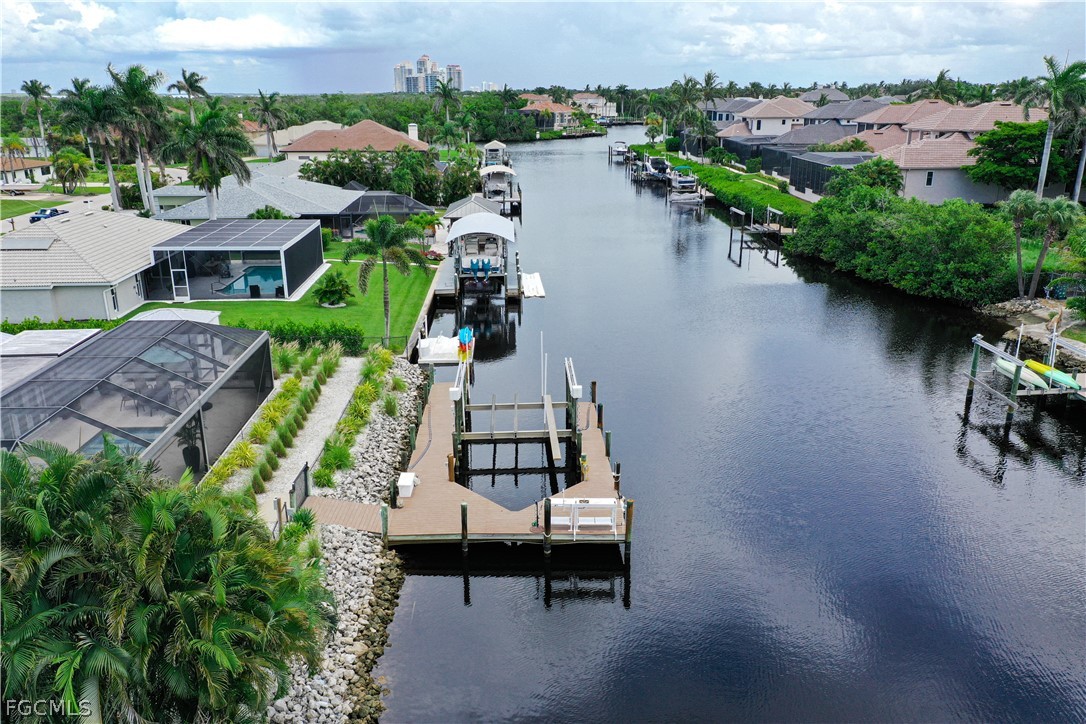 4902 Esplanade Street Estero, FL 34134 - Photo 37 of 40 an aerial view of a house with outdoor space and lake view