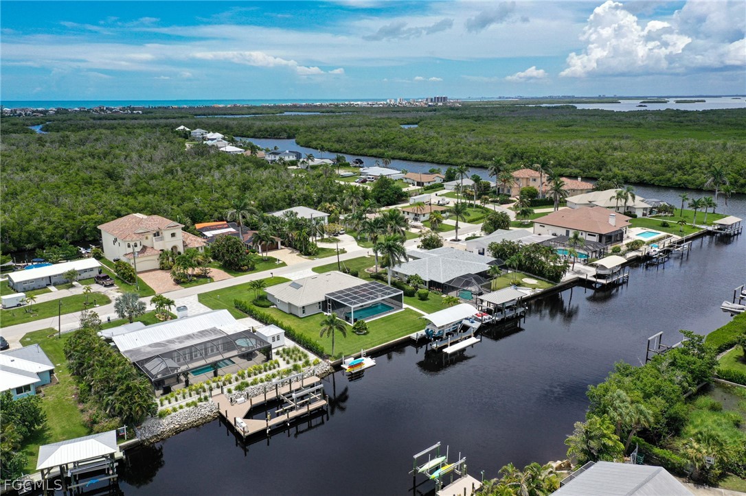 4902 Esplanade Street Estero, FL 34134 - Photo 38 of 40 an aerial view of a houses with a lake view