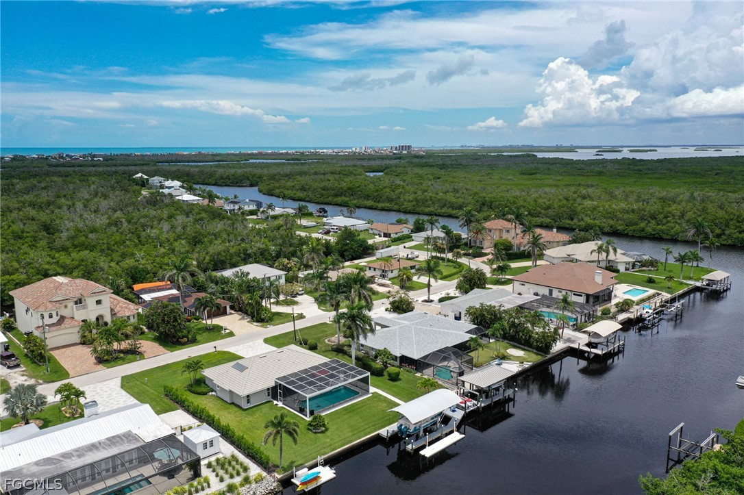 4902 Esplanade Street Estero, FL 34134 - Photo 39 of 40 an aerial view of a house with a garden