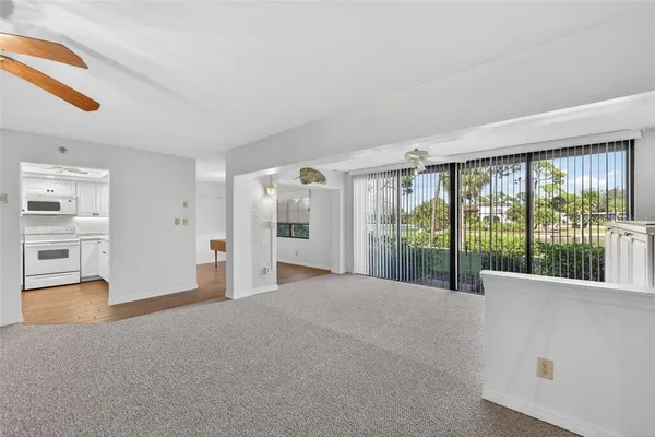 a bathroom with a shower toilet and sink