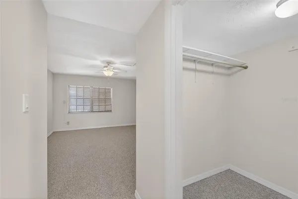 a view of a building with a yard