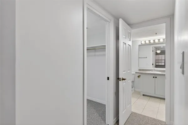 a view of a lake with houses in the back