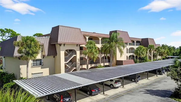 a view of a swimming pool with a yard