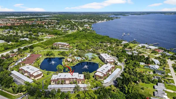 an aerial view of a house with outdoor space