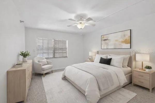 a bathroom with a sink and a window