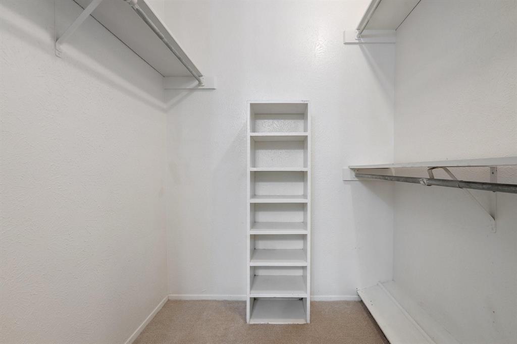 4533 North O'Connor Road, Unit 2208 Irving, TX 75062 - Photo 16 of 28 a view of walk in closet with empty racks