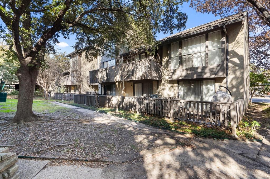 4533 North O'Connor Road, Unit 2208 Irving, TX 75062 - Photo 2 of 28 a view of a house with a yard