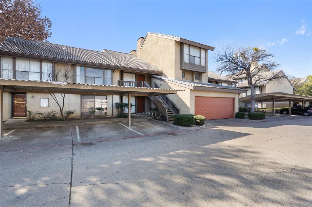 4533 North O'Connor Road, Unit 2208 Irving, TX 75062 - Photo 28 of 28 a view of a brick house with many windows